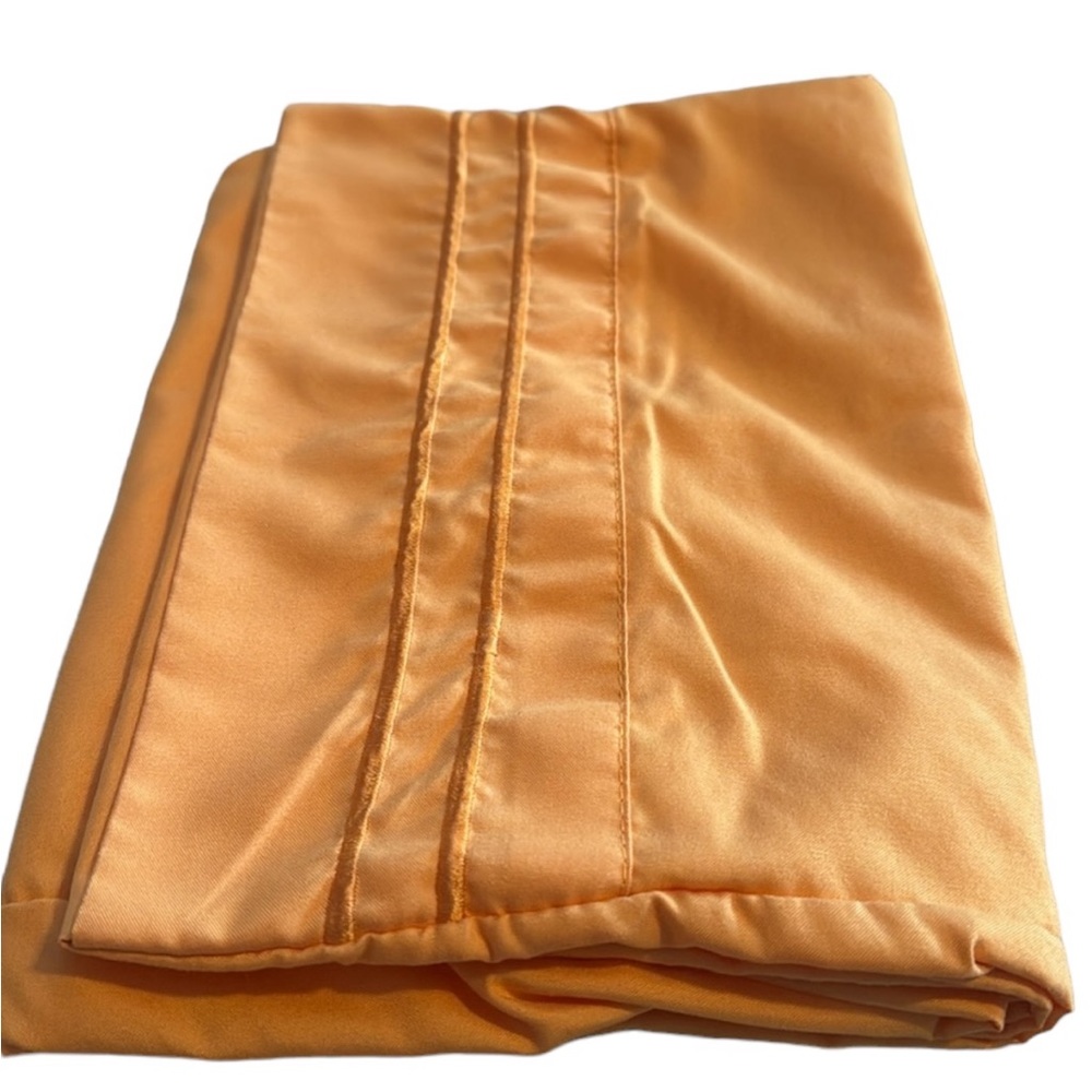 Pair of microfiber pillowcases in tangerine. EUC.